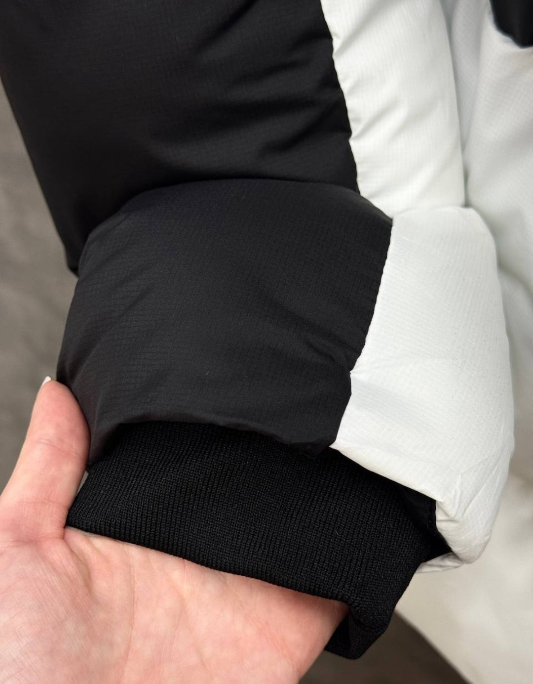 nike puffer jacket mens black and white