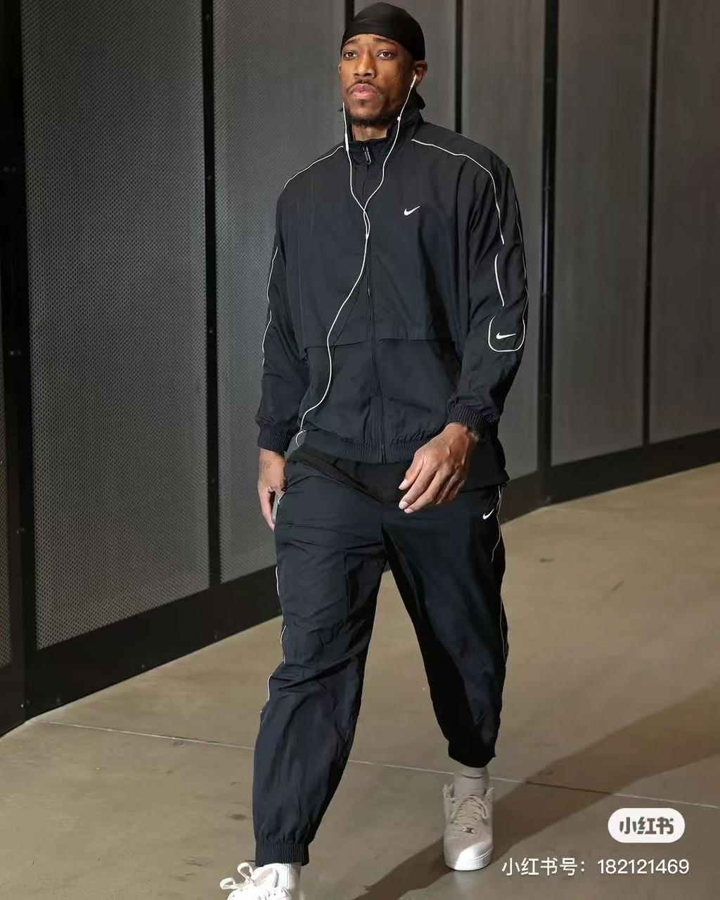 Nike Solo Swoosh Woven Tracksuit